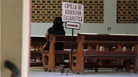 The Parish of Santisimo Sacramento is always bustling. A steady stream of parishioners can be seen kneeling in pray most every hour of the day. Bottom, is a motor taxi, one of the more common forms of transportation.