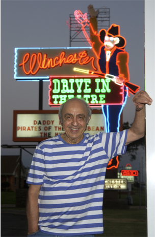 Owner and operator Lindy Shanbour in front of the Winchester Drive-In movie theater.  Staff Photo by Paul Hellstern